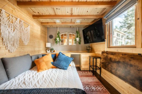 Santacon Tiny Ski Chalet in Woodland Park